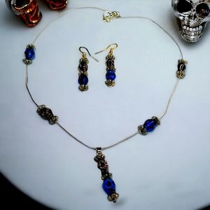 Screaming skull necklace and earrings set